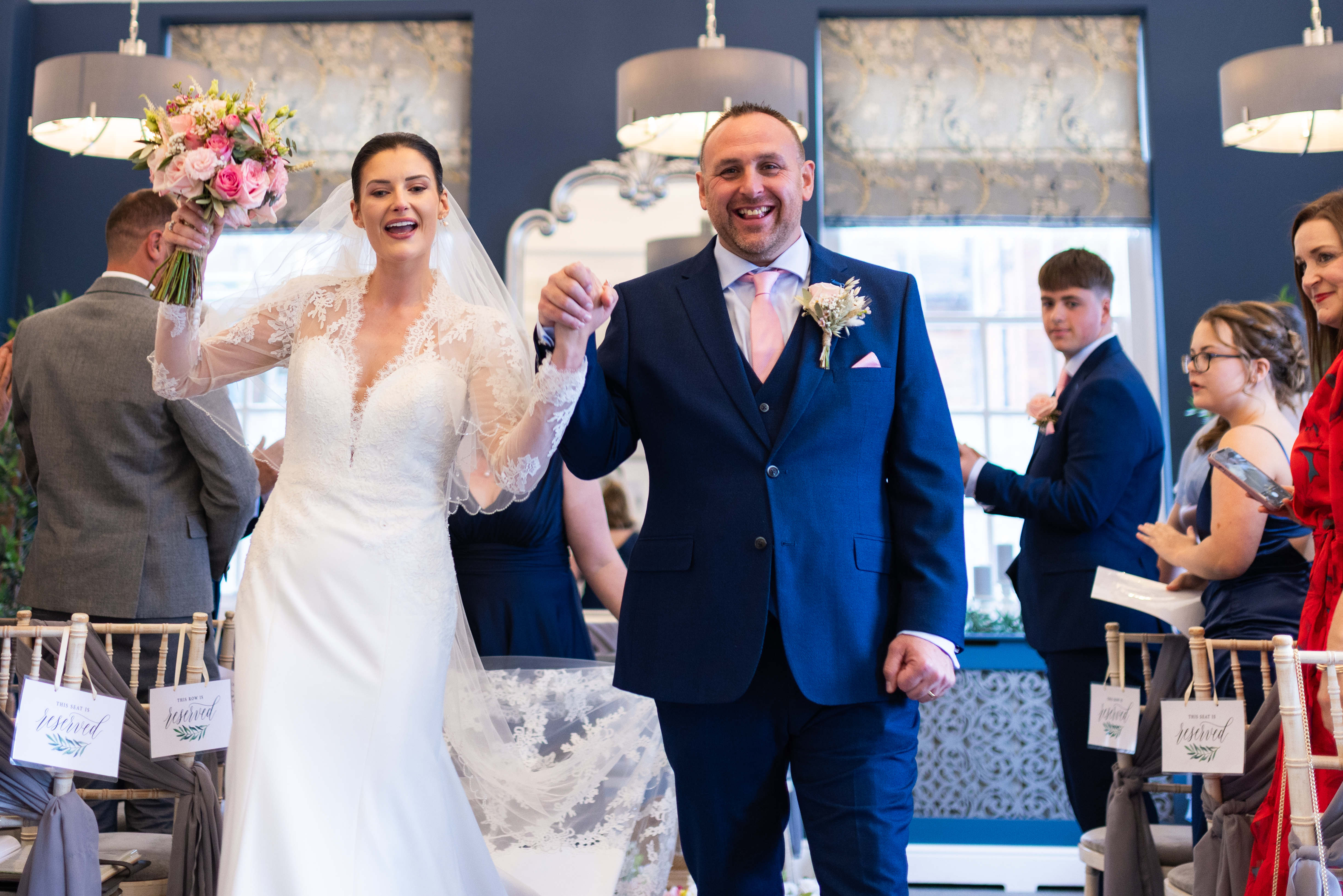 Bride and groom celebrating at Bury St Edmunds Register Office