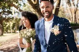 black-couple-just-married-with-confetti