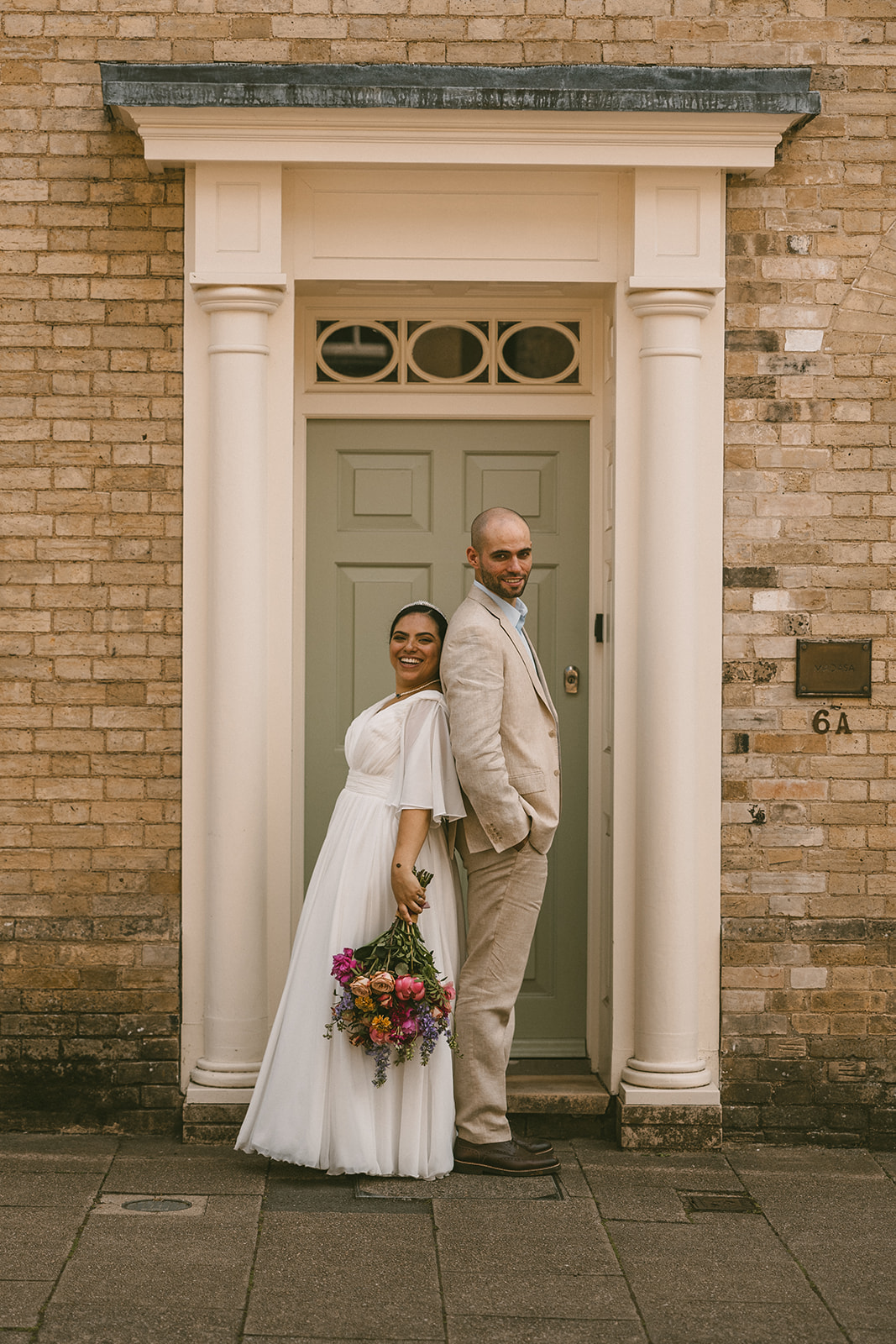 bride and groom in doorway