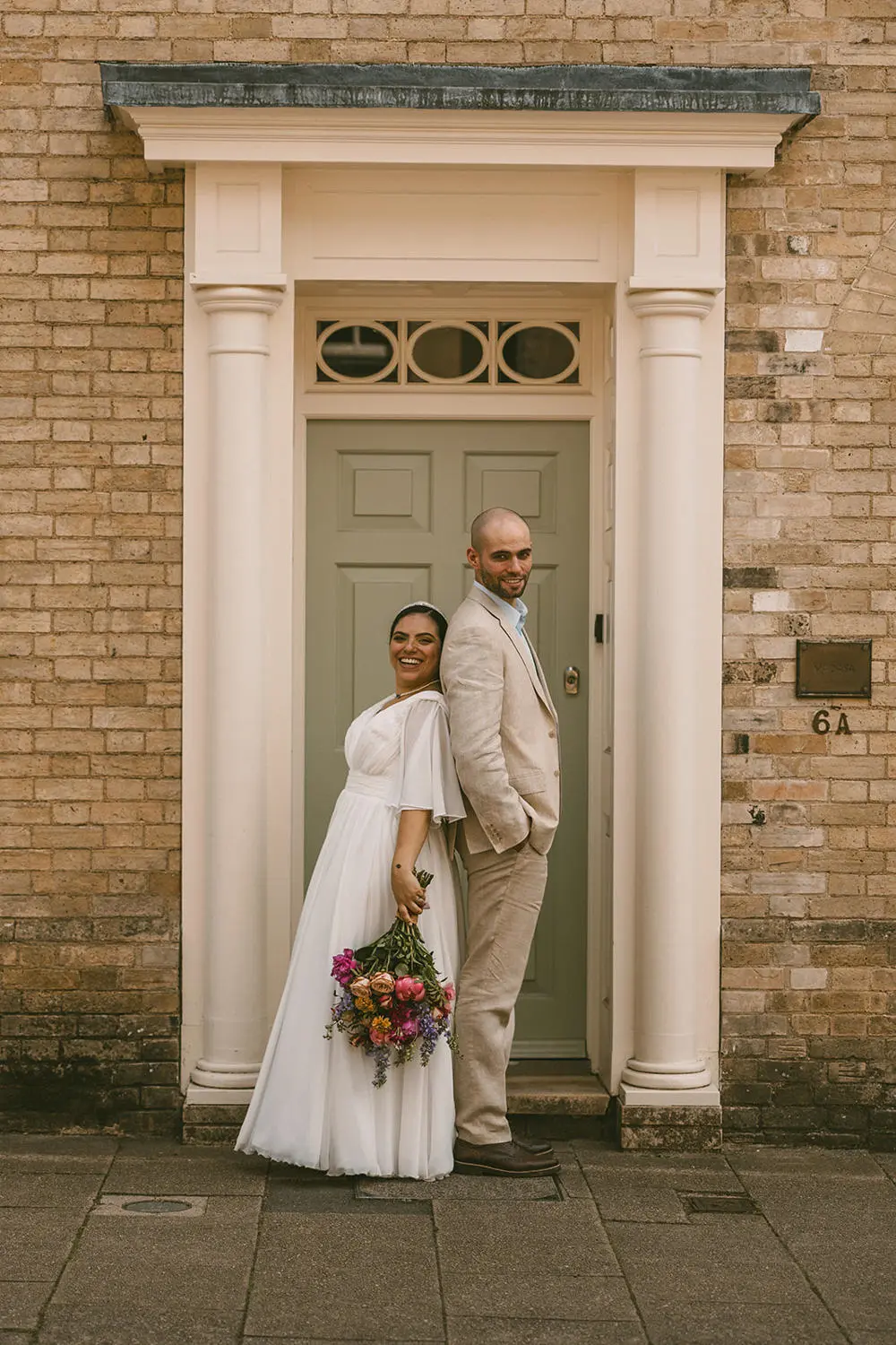 bride and groom in doorway