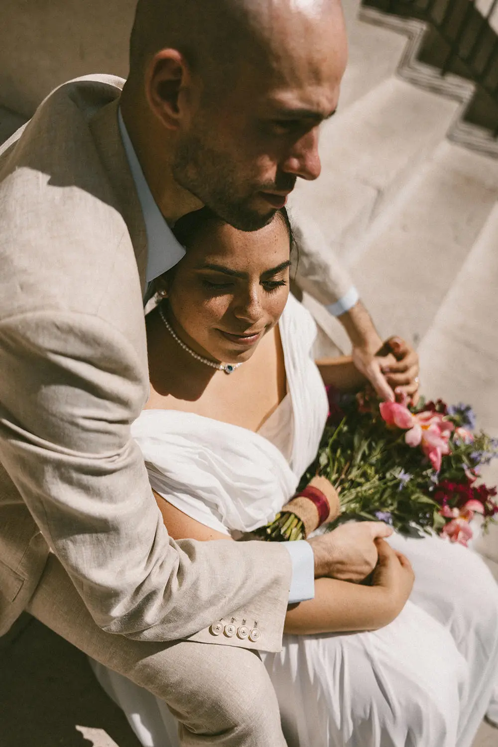 Couple embracing on steps