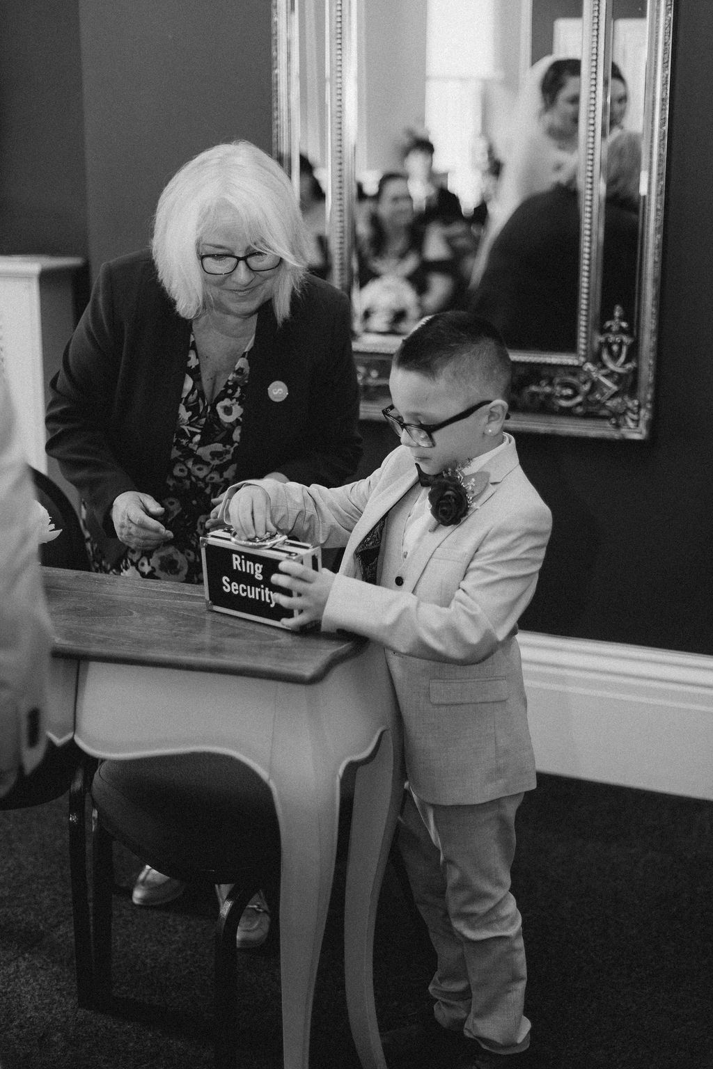 Little boy presenting the rings at a wedding at Ipswich Town Hall