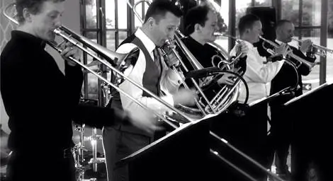 Five-piece brass ensemble playing