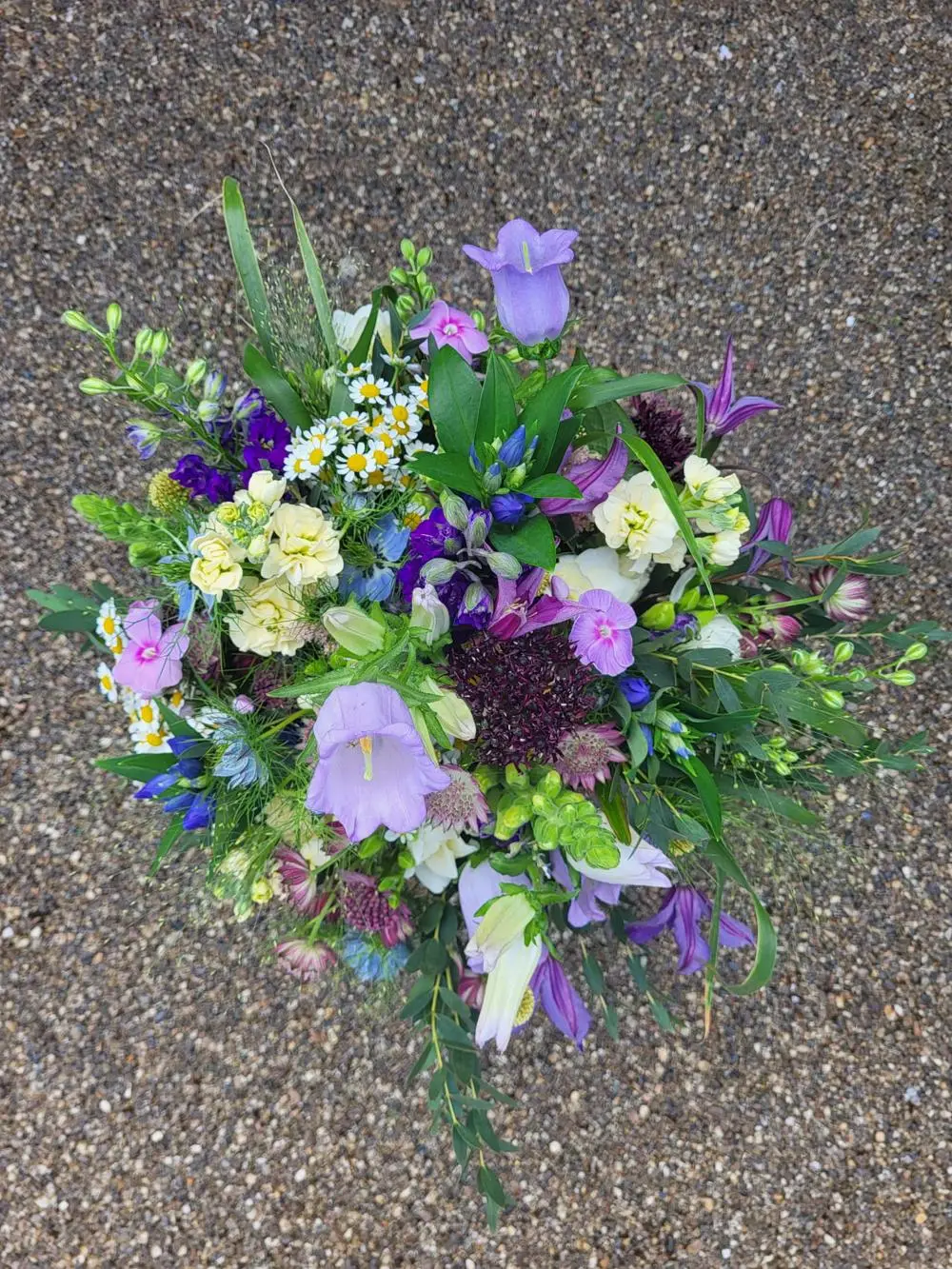 Beautiful blue, white, green bridal bouquet
