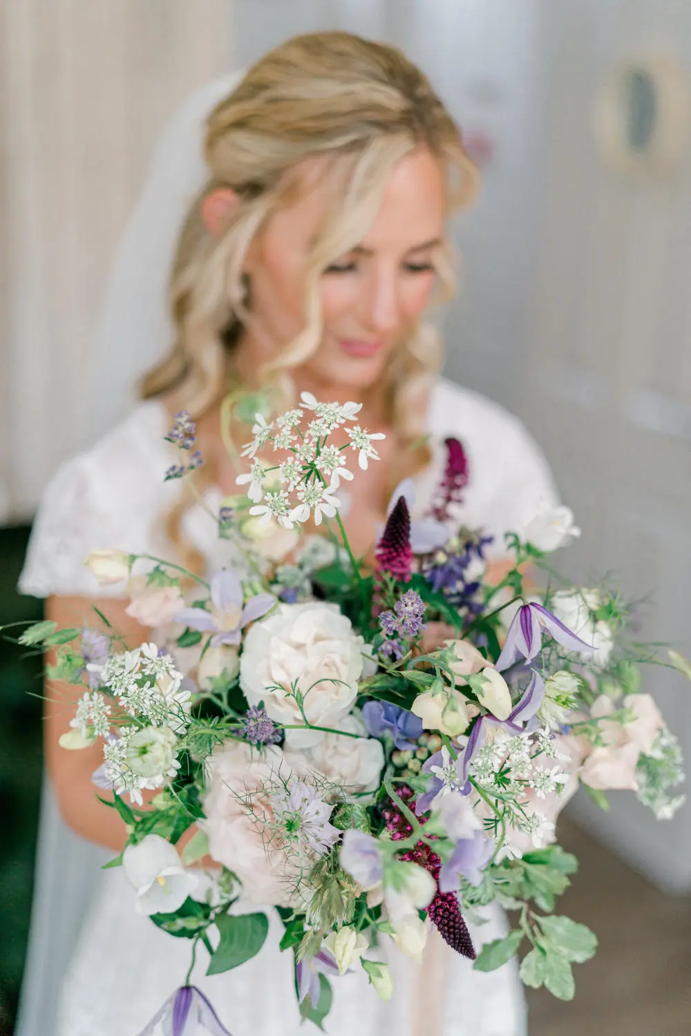 Bride showing off her beautiful bouquet