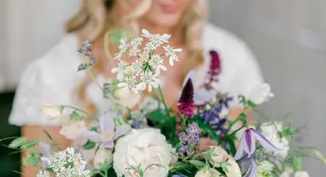 Bride showing off her beautiful bouquet