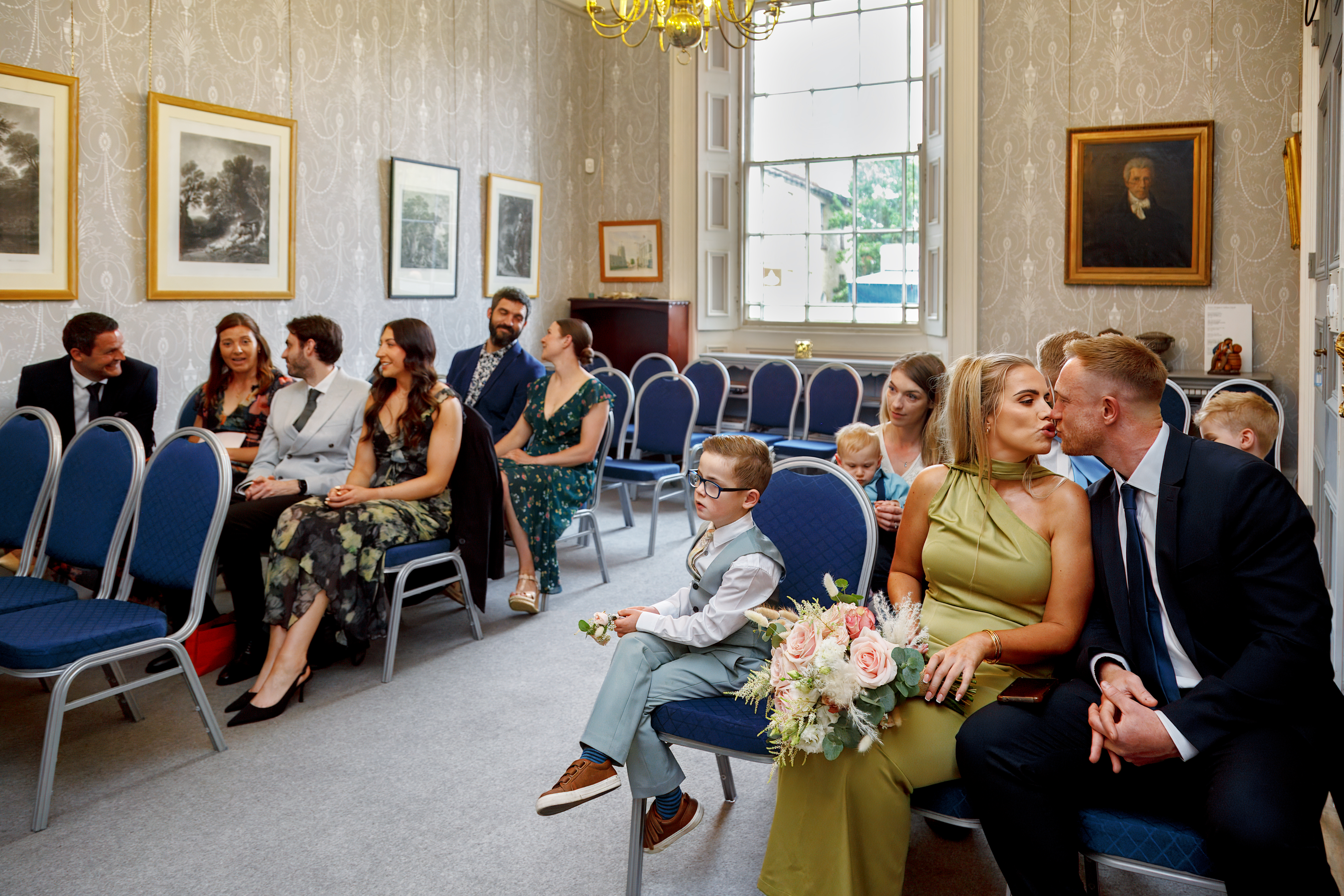 Guests awaiting couple at the Mayor's Parlour at the Sudbury Town Hall for their wedding