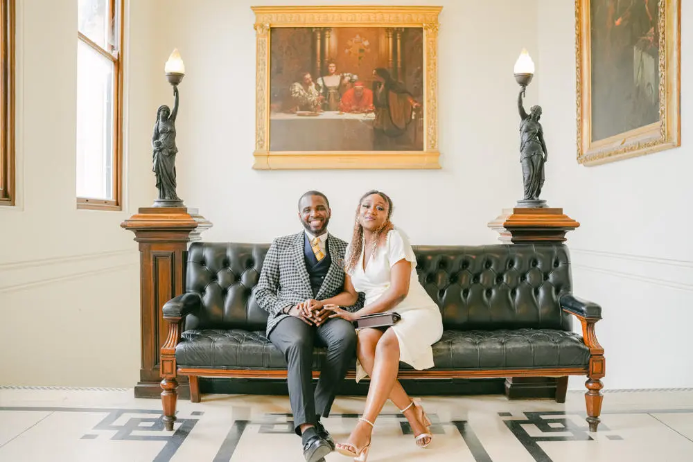 Couple sitting on sofa at Ipswich Town Hall