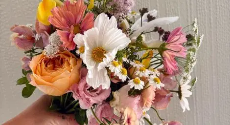 Beautiful bouquet with apricot, pale pink and white flowers