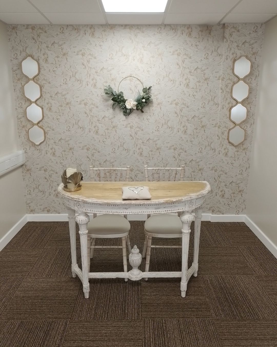 beautiful white ceremony table at the Woodbridge Register Office