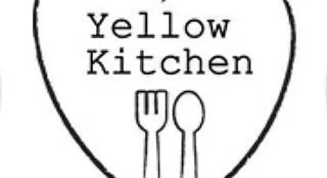 Yellow kitchen vegan catering company logo cutlery in heart
